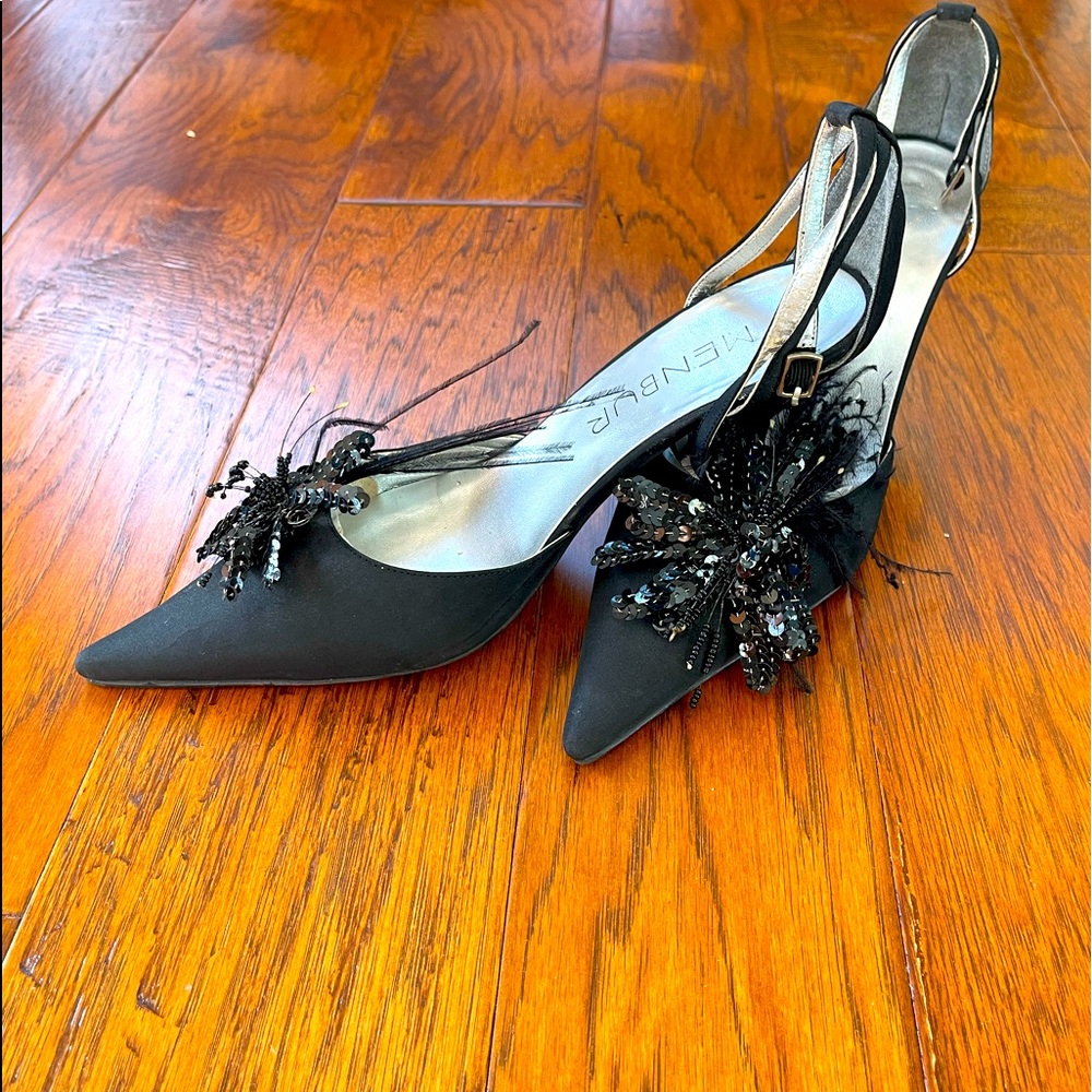 Vintage satin shoes from Menbur with feather and sequins. Very formal.